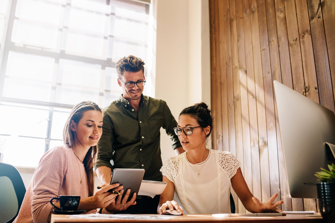 Team collaborating in a modern office setting